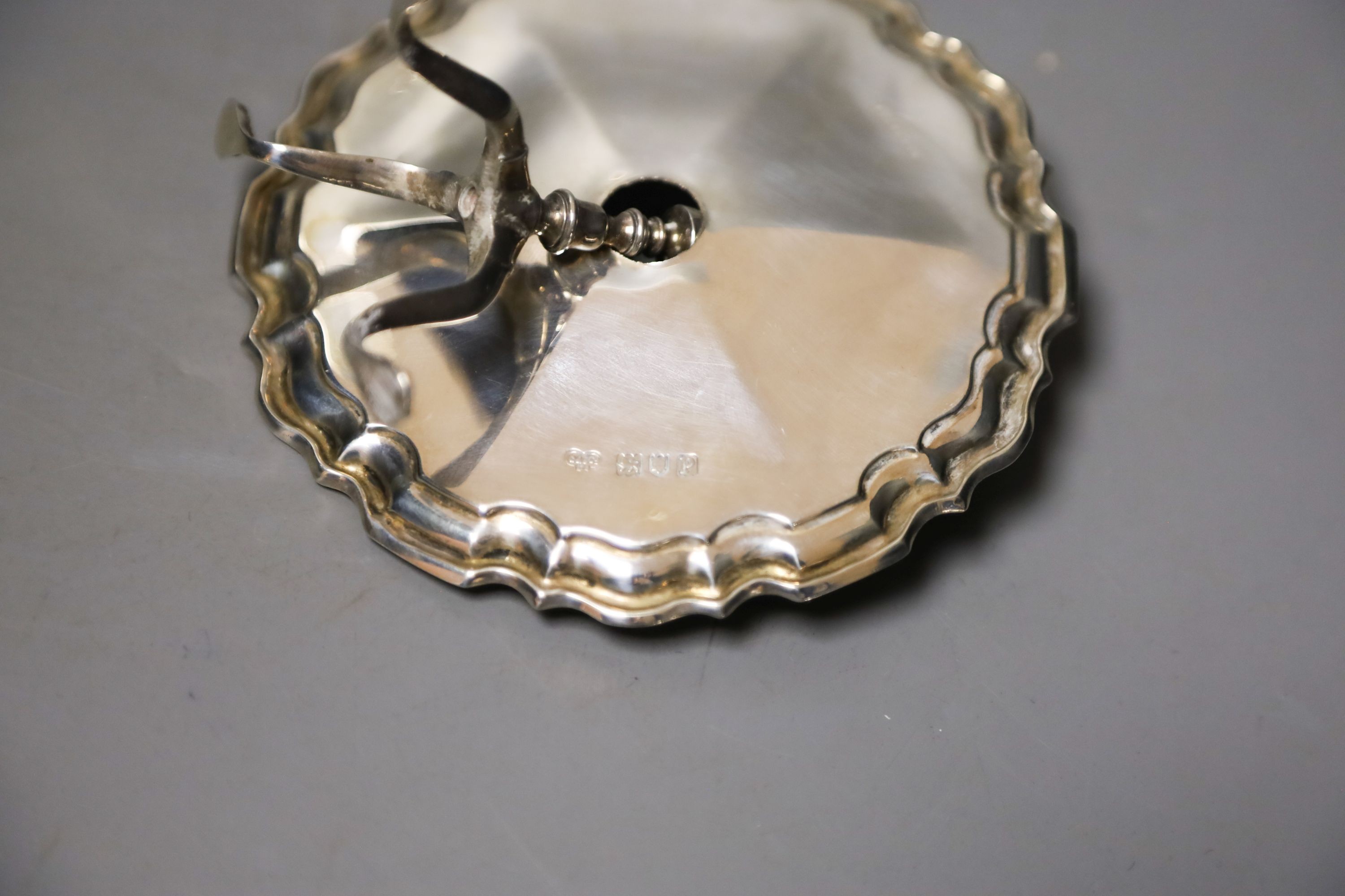 A George V silver miniature model of an occasional table(a.f.), Goldsmiths & Silversmiths Co Ltd, London, 1910, height 9.6cm, 91 grams.